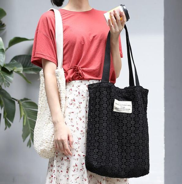 simple literary hollow shoulder bag lace student canvas bag wild fashion letter handbag
simple literary hollow shoulder bag lace student canvas bag wild fashion letter handbag