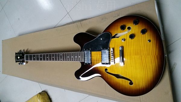 custom shop 50th anniversary 335 vintage sunburst cs semi hollow body jazz electric guitar flame maple back, dot inlays, chrome hardware
custom shop 50th anniversary 335 vintage sunburst cs semi hollow body jazz electric guitar flame maple back, dot inlays, chrome hardware