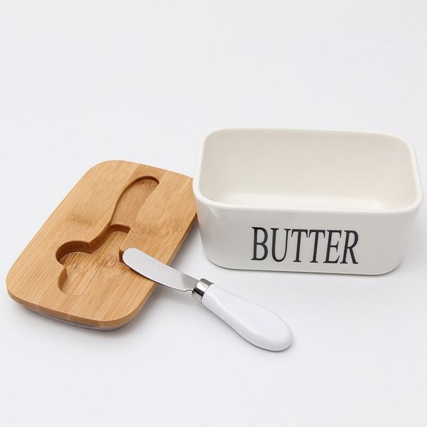 butter sealed ceramic box with butter whiteboard, wood cover and knife, cheese container tray
butter sealed ceramic box with butter whiteboard, wood cover and knife, cheese container tray