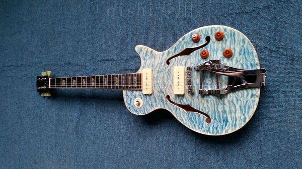 ebony wood fingerboard shell inlay hollow body electric guitar p90 pickups two f jack one piece body and one piece neck
ebony wood fingerboard shell inlay hollow body electric guitar p90 pickups two f jack one piece body and one piece neck