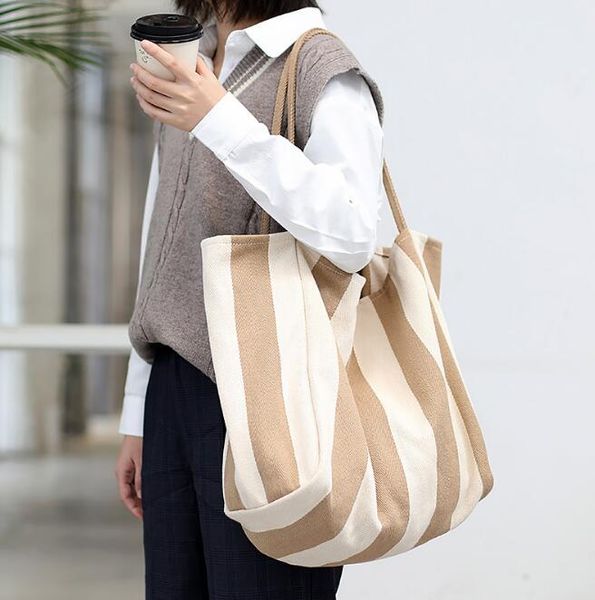 simple retro handbag wild small fresh striped canvas women's bag casual literature large capacity shoulder bag
simple retro handbag wild small fresh striped canvas women's bag casual literature large capacity shoulder bag