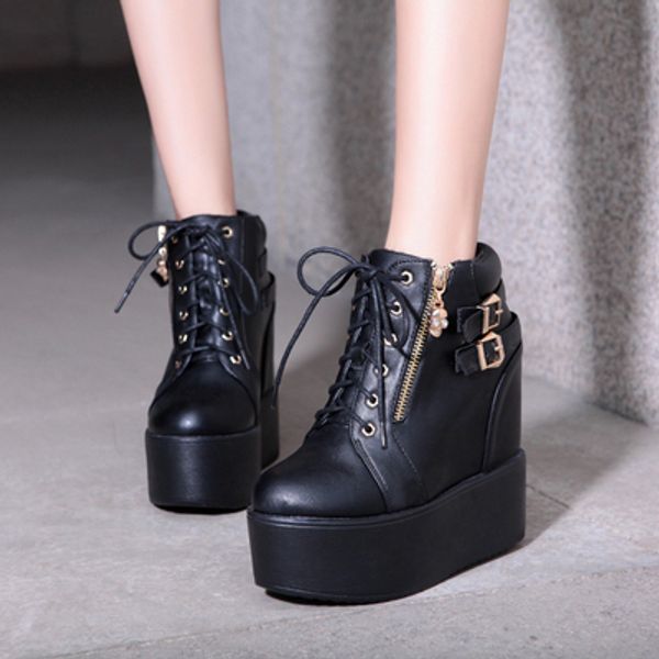 a 14cm wedge heel with a high platform boot and lace-up front, Black