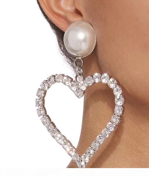 american fashion ladies big heart-shaped earrings fashion original to create pearl earrings counter with the same full diamond earrings, Golden;silver
american fashion ladies big heart-shaped earrings fashion original to create pearl earrings counter with the same full diamond earrings, Golden;silver