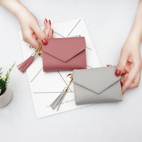 wallet female student short tassel waterproof wallet card package mini multi function folding wallet clip, Red;black
wallet female student short tassel waterproof wallet card package mini multi function folding wallet clip, Red;black
