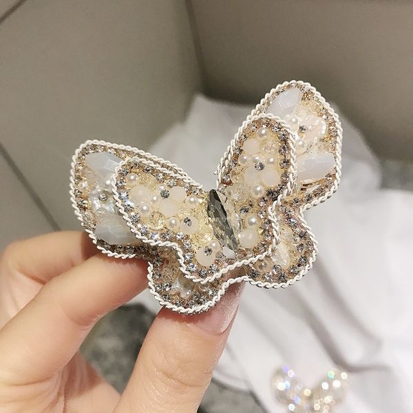 South Korea new butterfly rhinestone Butterfly Pearl rhinestone Pearl bangs hair accessories top spring clip side clip girls' hairpin eTK52
South Korea new butterfly rhinestone Butterfly Pearl rhinestone Pearl bangs hair accessories top spring clip side clip girls' hairpin eTK52
