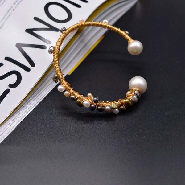 Vintage pearl bracelet. Hand-made open ladies bracelet. Trendy weird baroque pearl. Golden bracelet jewelry
Vintage pearl bracelet. Hand-made open ladies bracelet. Trendy weird baroque pearl. Golden bracelet jewelry