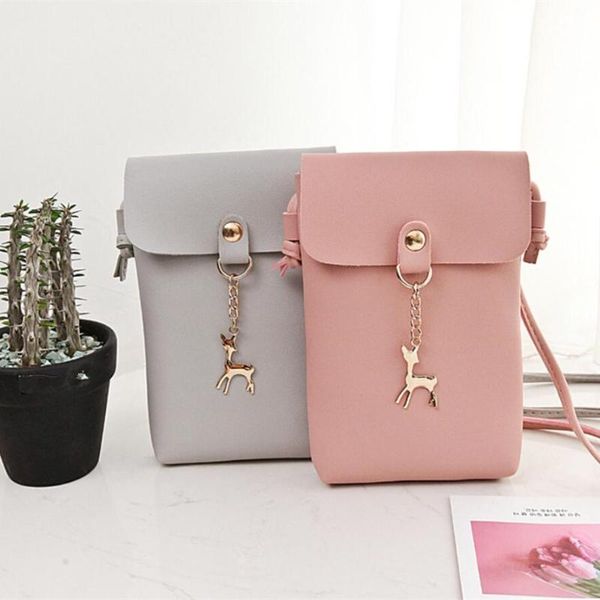 m518 popular fashion women messenger bag metal fawn pendant hasp vertical section women's mobile phone packet girl handbag
m518 popular fashion women messenger bag metal fawn pendant hasp vertical section women's mobile phone packet girl handbag
