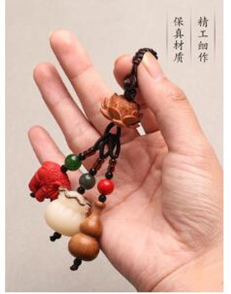 peach wood gourd money bag key chain cinnabar car key pendant bodhi lucky bag male and female couple ornaments, Silver
peach wood gourd money bag key chain cinnabar car key pendant bodhi lucky bag male and female couple ornaments, Silver