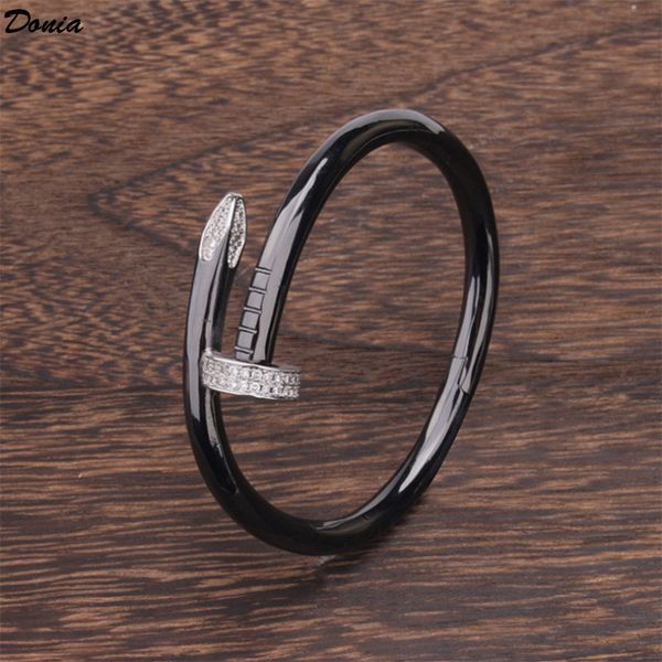 Donia jewelry party European and American fashion Cardi series large nail micro inlaid Zirconia Bracelet women's black gold bracelet
Donia jewelry party European and American fashion Cardi series large nail micro inlaid Zirconia Bracelet women's black gold bracelet