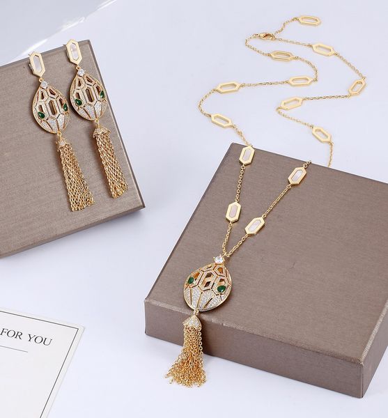 designer cubic zircon stone animal long tassel yellow gold plated long necklaces and earrings party jewelry sets for women, Silver
designer cubic zircon stone animal long tassel yellow gold plated long necklaces and earrings party jewelry sets for women, Silver