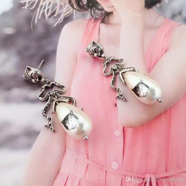retro silver cat head letters earrings waterdrop pearl dangle earring 925 silver needle ear studs women girl party prom jewelry, Golden;silver
retro silver cat head letters earrings waterdrop pearl dangle earring 925 silver needle ear studs women girl party prom jewelry, Golden;silver