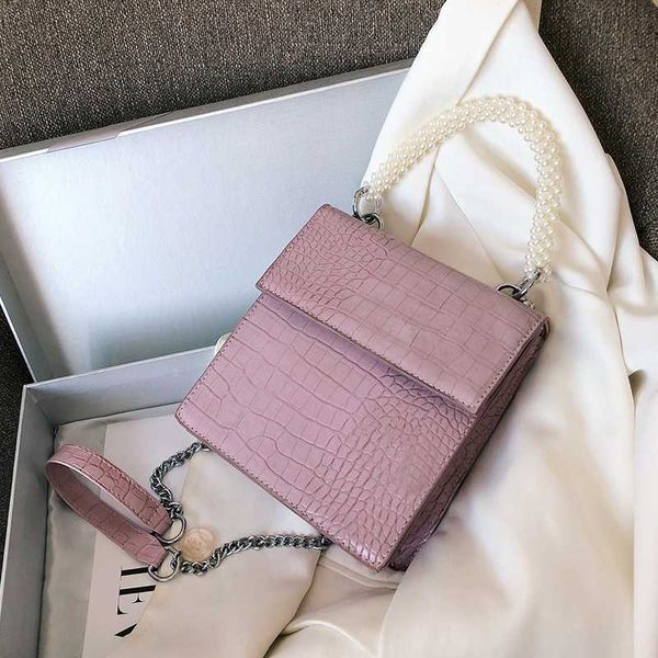 wild pu leather women's pearl hand bag 2020 new fashion chain shoulder bag shi tou wen ms. designer portable small package
wild pu leather women's pearl hand bag 2020 new fashion chain shoulder bag shi tou wen ms. designer portable small package