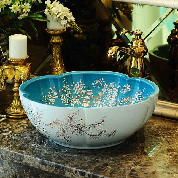 jingdezhen factory directly art hand painted ceramic wash basin bathroom sinks blue and white
jingdezhen factory directly art hand painted ceramic wash basin bathroom sinks blue and white