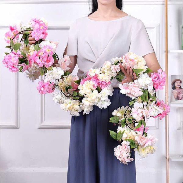 170cm artificial cherry blossoms rattan branches silk liana vines plastic flowers on the wall wedding home decor hanging garland
170cm artificial cherry blossoms rattan branches silk liana vines plastic flowers on the wall wedding home decor hanging garland