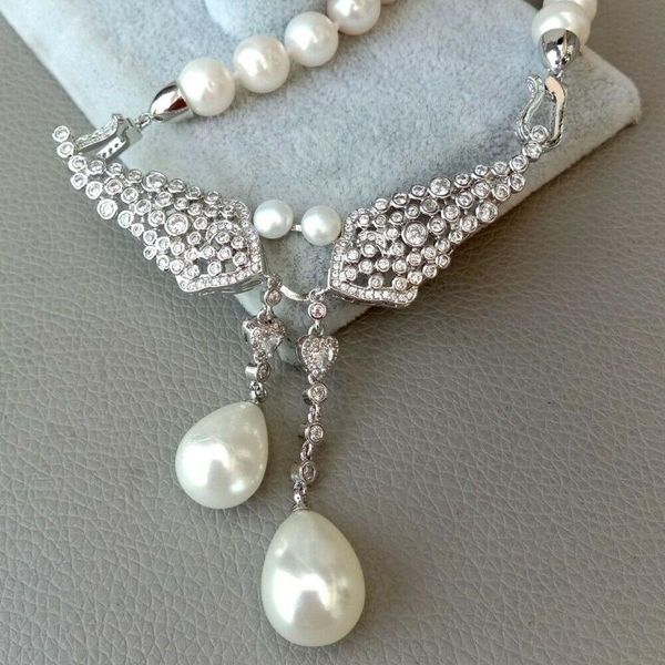 hand knotted 51cm natural cultured 8-9mm white freshwater pearl necklace sea shell pearl cz pendant fashion jewelry, Silver
hand knotted 51cm natural cultured 8-9mm white freshwater pearl necklace sea shell pearl cz pendant fashion jewelry, Silver