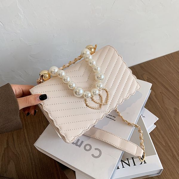 western style pearl square handbag 2020 new pu leather women's designer fashion texture one-shoulder messenger bag
western style pearl square handbag 2020 new pu leather women's designer fashion texture one-shoulder messenger bag