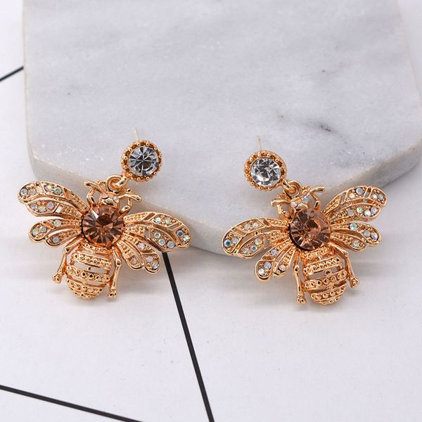 vintage gold cute bee женщин способа серьги циркон 3d bee stud для girlfriend сияющий кельтский стиль шарм ювелирные изделия, Golden
vintage gold cute bee женщин способа серьги циркон 3d bee stud для girlfriend сияющий кельтский стиль шарм ювелирные изделия, Golden