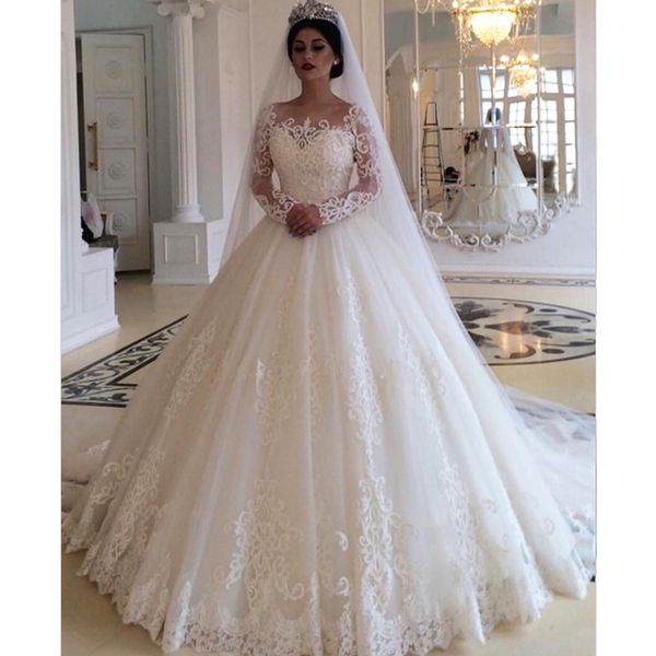Beautiful Princess Ball Gown Wedding Dresses Jewel Neck Long Sleeve Lace Appliques Chapel Wedding Gown Tulle Plus Size Bridal Dress
Beautiful Princess Ball Gown Wedding Dresses Jewel Neck Long Sleeve Lace Appliques Chapel Wedding Gown Tulle Plus Size Bridal Dress