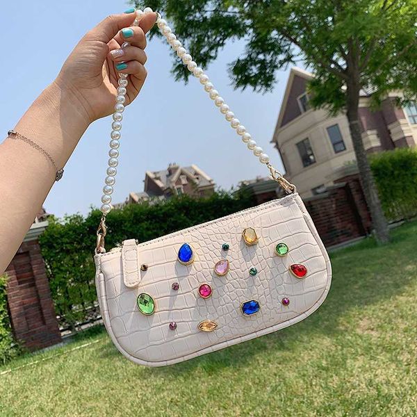 crocodile pattern pearl tote bag 2020 fashion new high-quality leather women's designer handbag diamond shoulder messenger bag
crocodile pattern pearl tote bag 2020 fashion new high-quality leather women's designer handbag diamond shoulder messenger bag