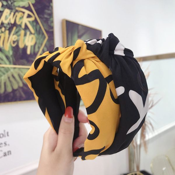 hair accessories lady's headband, korean version with fabric letters tied in the middle of back side, wide-brimmed headband
hair accessories lady's headband, korean version with fabric letters tied in the middle of back side, wide-brimmed headband