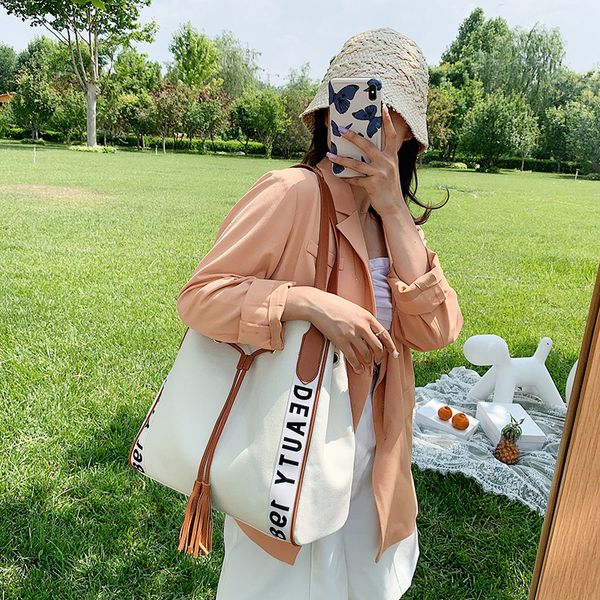 purfay capacity canvas women shoulder bag cotton tote shopper bag tassels reusable fashion cloth messenger
purfay capacity canvas women shoulder bag cotton tote shopper bag tassels reusable fashion cloth messenger