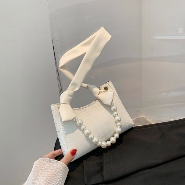 new sweet style shoulder bag solid color pu female bag pearl chain handbag saddle fashion messenger wallet
new sweet style shoulder bag solid color pu female bag pearl chain handbag saddle fashion messenger wallet