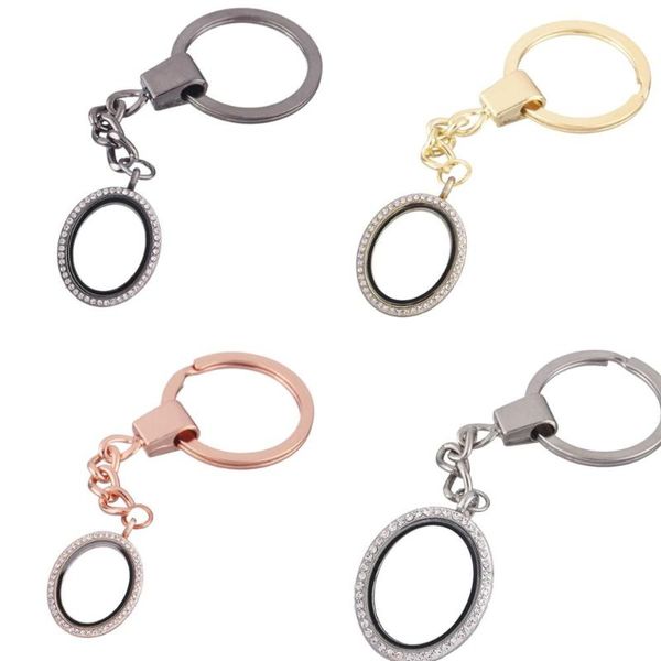 1pcs oval zinc alloy with rhinestone floating charms locket keychain diy magnetic twist living memory glass locket key ring, Silver
1pcs oval zinc alloy with rhinestone floating charms locket keychain diy magnetic twist living memory glass locket key ring, Silver