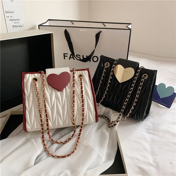 female tote bag 2020 fashion new quality chains leather women's designer handbag sac a main shoulder messenger bag
female tote bag 2020 fashion new quality chains leather women's designer handbag sac a main shoulder messenger bag