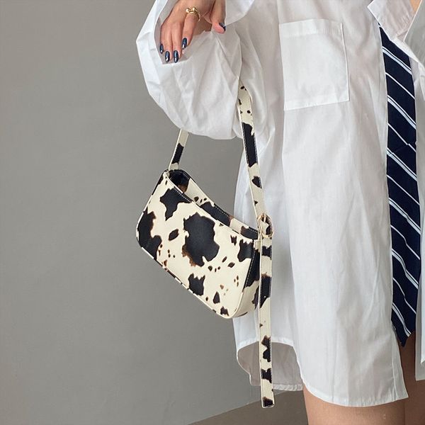 fashion design milk cow print women underarm baguette handbags vintage pu leather girls shoulder messenger bags women armpit bag
fashion design milk cow print women underarm baguette handbags vintage pu leather girls shoulder messenger bags women armpit bag