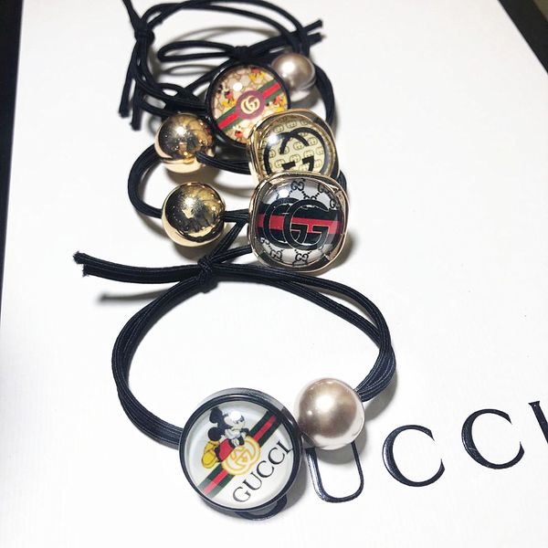 women brand hair designer's four piece set women's hair rope hairpin brand band headband hair string four gifts 1, Golden;silver
women brand hair designer's four piece set women's hair rope hairpin brand band headband hair string four gifts 1, Golden;silver