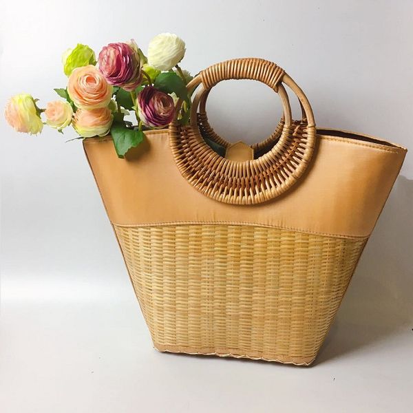 new fashion personalized handmade rattan bag trendy bamboo woven straw tote creative trend woven tote
new fashion personalized handmade rattan bag trendy bamboo woven straw tote creative trend woven tote