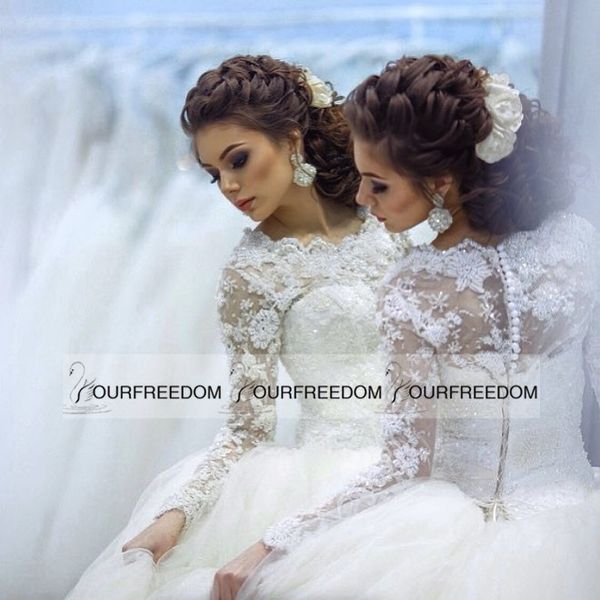

Luxury 2019 Jewel Lace Wedding Gowns Long Sleeves Gorgeous Beading Appliques Tulle Cover Buttons Chapel Train Bridal Gowns Wedding Dresses