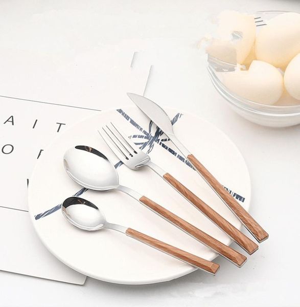 4pcs/set silver dinnerware set stainless steel tableware set knife fork spoon luxury cutlery wood grain handle xb 058
4pcs/set silver dinnerware set stainless steel tableware set knife fork spoon luxury cutlery wood grain handle xb 058