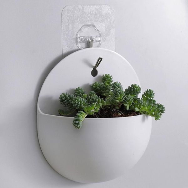 nordic modern decorative white vases hanging flower vase wall shelf matte transparent plastic vases for the interior home decor
nordic modern decorative white vases hanging flower vase wall shelf matte transparent plastic vases for the interior home decor