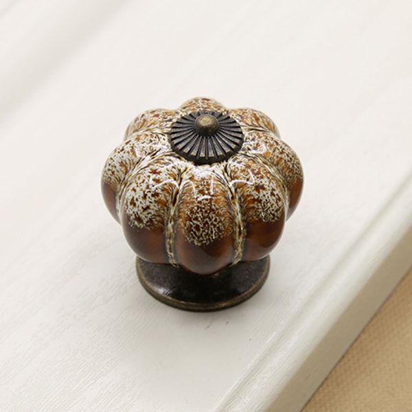 cabinet pull handle cupboard drawer pumpkin shape single hole round ceramic knob 
cabinet pull handle cupboard drawer pumpkin shape single hole round ceramic knob