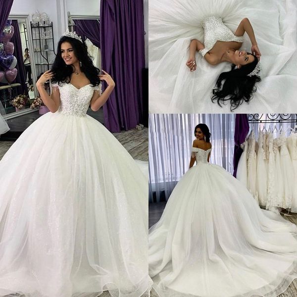 2020 Stunning Crystals Beaded Ball Gown Wedding Dresses Sexy Off Shoulder Cap Sleeve Bridal Gown Puffy Corset Back Vestidos De Novia AL5804
2020 Stunning Crystals Beaded Ball Gown Wedding Dresses Sexy Off Shoulder Cap Sleeve Bridal Gown Puffy Corset Back Vestidos De Novia AL5804