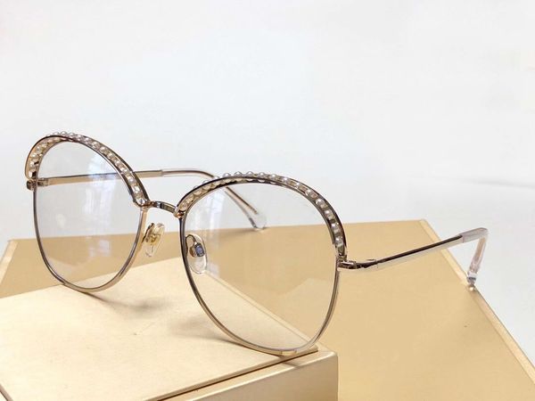 round sunglasses gold/clear lens 4246 sun glasses lunette de soleil fashion women pearls sunglasses with box, White;black
round sunglasses gold/clear lens 4246 sun glasses lunette de soleil fashion women pearls sunglasses with box, White;black