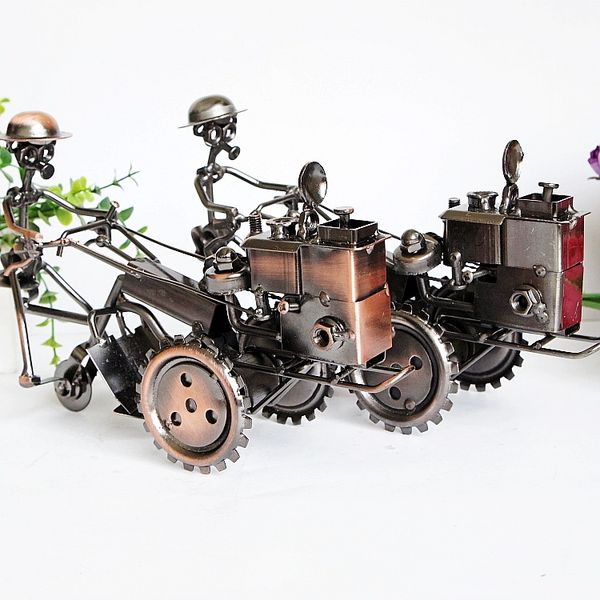 factory direct wrought iron retro ornaments handmade textured metal tractor model can slide rotating two colors
factory direct wrought iron retro ornaments handmade textured metal tractor model can slide rotating two colors