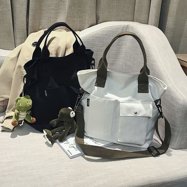 canvas large bag female bag new leisure large capacity student class solid color portable tote shoulder messenger
canvas large bag female bag new leisure large capacity student class solid color portable tote shoulder messenger