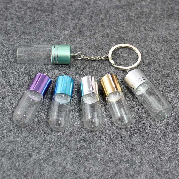 2pcs 35x15mm/45 glass bottle key ring pendant perfume dispensing small bottle keychain friend gift for her, Silver
2pcs 35x15mm/45 glass bottle key ring pendant perfume dispensing small bottle keychain friend gift for her, Silver
