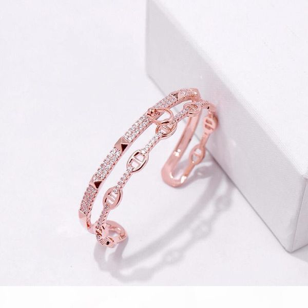 foreign trade copper plated gold jewelry beautiful and simple diamond small rivet c pig nose bracelet womens bracelets, Black
foreign trade copper plated gold jewelry beautiful and simple diamond small rivet c pig nose bracelet womens bracelets, Black