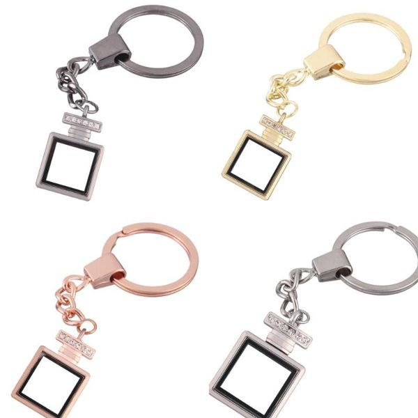 1pcs perfume bottle zinc alloy rhinestone floating charms locket keychain diy magnetic twist living memory glass locket key ring, Silver
1pcs perfume bottle zinc alloy rhinestone floating charms locket keychain diy magnetic twist living memory glass locket key ring, Silver
