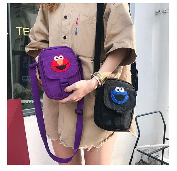 sesame street elmo cookie monster canvas messenger shoulder crossbody bag cell phone pocket cute cartoon purse for kid girl
sesame street elmo cookie monster canvas messenger shoulder crossbody bag cell phone pocket cute cartoon purse for kid girl