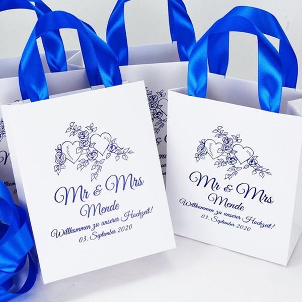 gift wrap personalized mr & mrs wedding welcome bags with royal blue satin ribbon elegant gifts and favors for guests
gift wrap personalized mr & mrs wedding welcome bags with royal blue satin ribbon elegant gifts and favors for guests