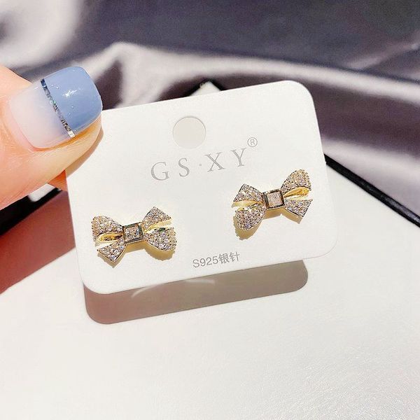 migga micro paved cubic zircon bowknot stud earrings fashion women party gift jewelry gold color, Golden;silver
migga micro paved cubic zircon bowknot stud earrings fashion women party gift jewelry gold color, Golden;silver