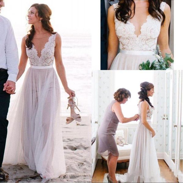 selling boho beach v-neck a line wedding dresses elegant lace floor length tulle wedding bridal gowns covered button plus size
selling boho beach v-neck a line wedding dresses elegant lace floor length tulle wedding bridal gowns covered button plus size