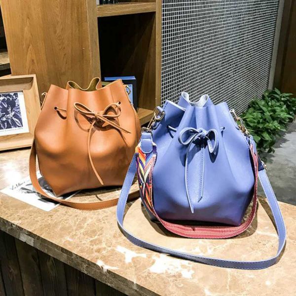 cute new women bag with colorful strap bucket bag women pu leather shoulder bags brand designer ladies crossbody messenger bags
cute new women bag with colorful strap bucket bag women pu leather shoulder bags brand designer ladies crossbody messenger bags