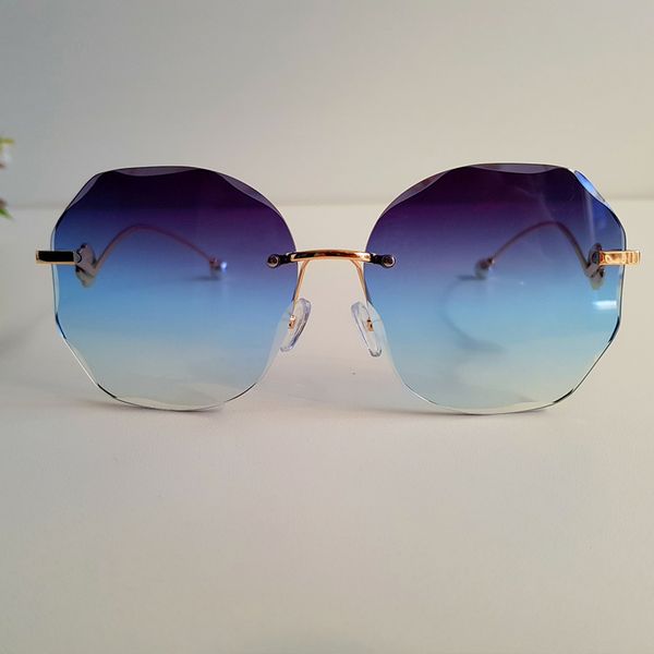 womens sunglasses brand designer fashion frameless trimmed round new glasses pearl flower lady glasses high quality, White;black
womens sunglasses brand designer fashion frameless trimmed round new glasses pearl flower lady glasses high quality, White;black