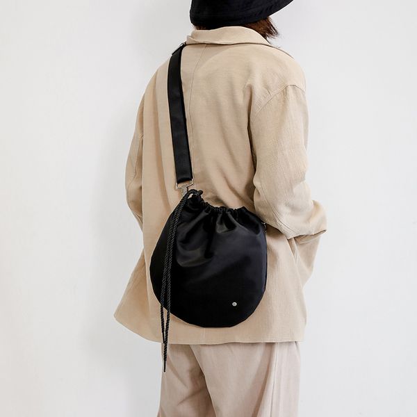 2020 round drawstring nylon messenger bag simple all-match bag ins korean single shoulder small circle women handbags
2020 round drawstring nylon messenger bag simple all-match bag ins korean single shoulder small circle women handbags