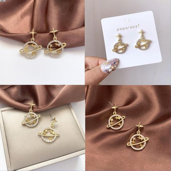 female silver needle high sense universe starry sky micro studded with diamond ear studs light luxury ear jewelry accessories wholesale, Golden
female silver needle high sense universe starry sky micro studded with diamond ear studs light luxury ear jewelry accessories wholesale, Golden